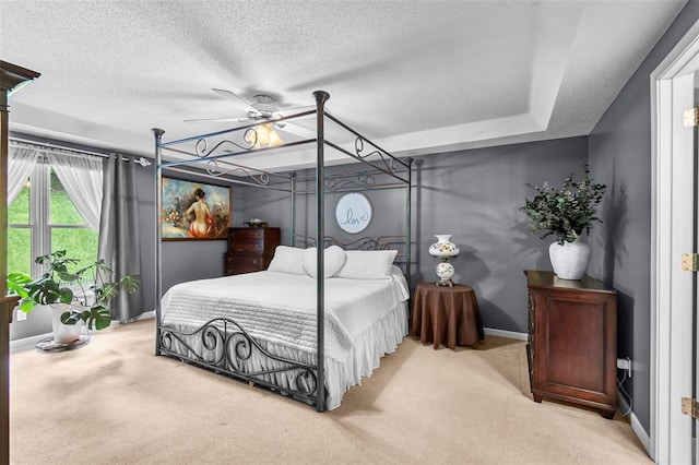 1711 El Rio Dr, Cape Girardeau, MO 63701 - carpeted bedroom featuring baseboards, a textured ceiling, and ceiling fan