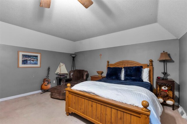 1711 El Rio Dr, Cape Girardeau, MO 63701 - bedroom with light colored carpet, ceiling fan, baseboards, a textured ceiling, and lofted ceiling