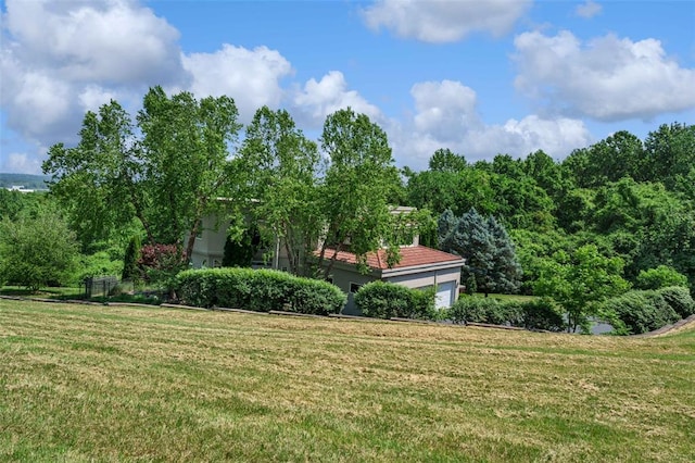 169 Fick Farm Rd, Chesterfield, MO 63005 - view of green lawn with a garage