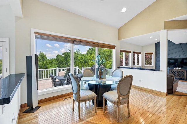 169 Fick Farm Rd, Chesterfield, MO 63005 - dining room featuring hardwood / wood-style floors, plenty of natural light, baseboards, high vaulted ceiling, and recessed lighting