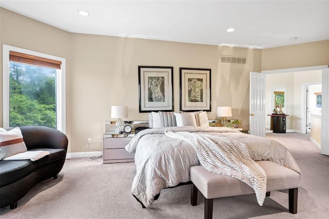 169 Fick Farm Rd, Chesterfield, MO 63005 - bedroom with light carpet, baseboards, multiple windows, and recessed lighting