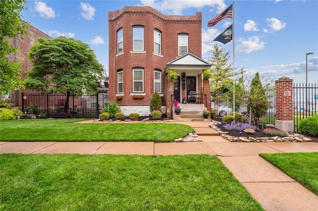 view of front of house featuring brick siding
