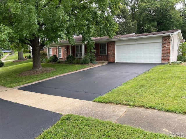 12036 Orchard View Dr, Creve Coeur Township, MO 63146 - ranch-style home featuring brick siding, driveway, a front lawn, and an attached garage