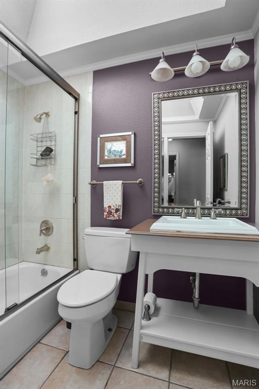 12036 Orchard View Dr, Creve Coeur Township, MO 63146 - bathroom with tile patterned flooring, combined bath / shower with glass door, and vanity