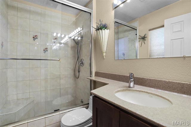 12036 Orchard View Dr, Creve Coeur Township, MO 63146 - bathroom featuring a textured wall, vanity, and a tile shower
