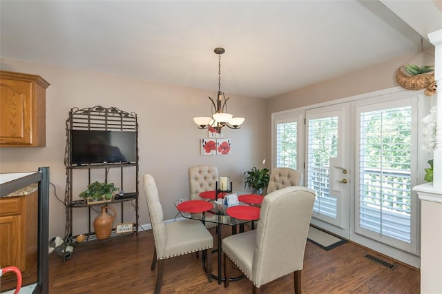 55 Rue De Paix Dr, Lake St Louis, MO 63367 - dining area with dark wood finished floors and a chandelier