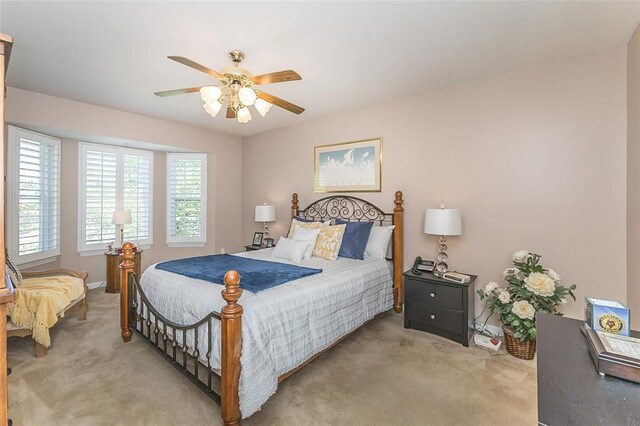 55 Rue De Paix Dr, Lake St Louis, MO 63367 - bedroom featuring light colored carpet and ceiling fan