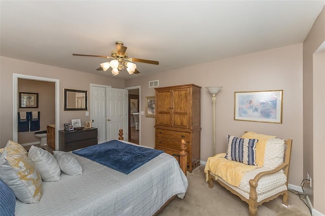 55 Rue De Paix Dr, Lake St Louis, MO 63367 - bedroom featuring light carpet, baseboards, a ceiling fan, and ensuite bath