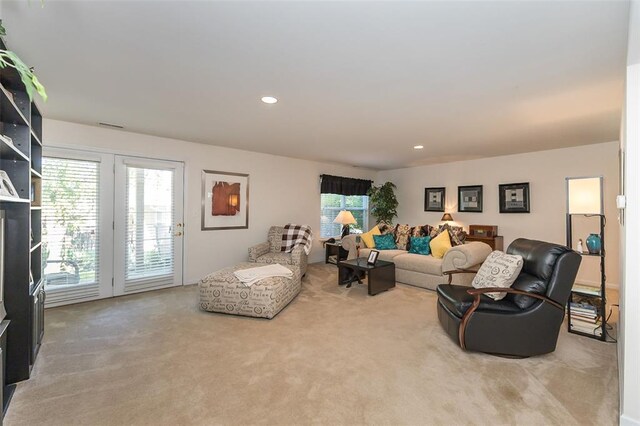 55 Rue De Paix Dr, Lake St Louis, MO 63367 - living area with light colored carpet and recessed lighting