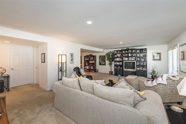 55 Rue De Paix Dr, Lake St Louis, MO 63367 - living area with light colored carpet and recessed lighting