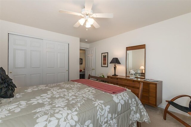 55 Rue De Paix Dr, Lake St Louis, MO 63367 - carpeted bedroom featuring a closet and a ceiling fan