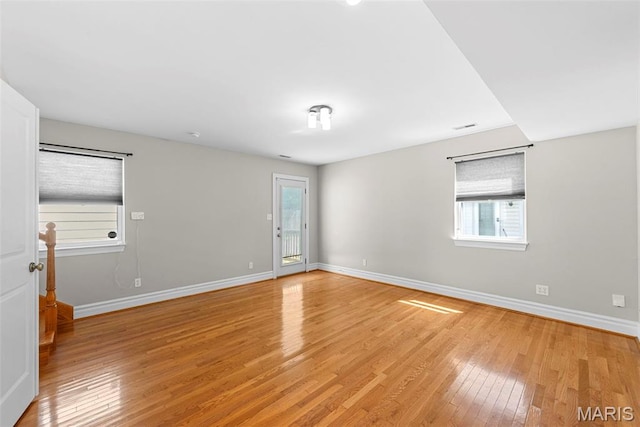 8261 Watson Rd, Saint Louis, MO 63119 - empty room featuring light wood finished floors and healthy amount of natural light