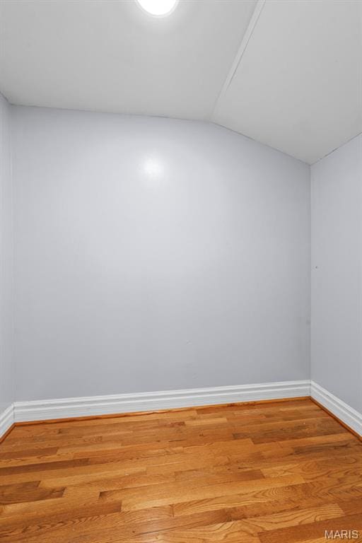 8261 Watson Rd, Saint Louis, MO 63119 - spare room featuring light wood-type flooring and lofted ceiling