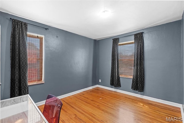 8261 Watson Rd, Saint Louis, MO 63119 - unfurnished bedroom with wood finished floors