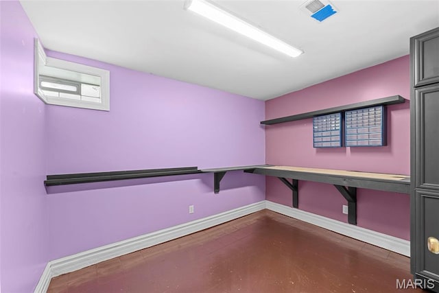 8261 Watson Rd, Saint Louis, MO 63119 - unfurnished office featuring baseboards and dark wood-style flooring