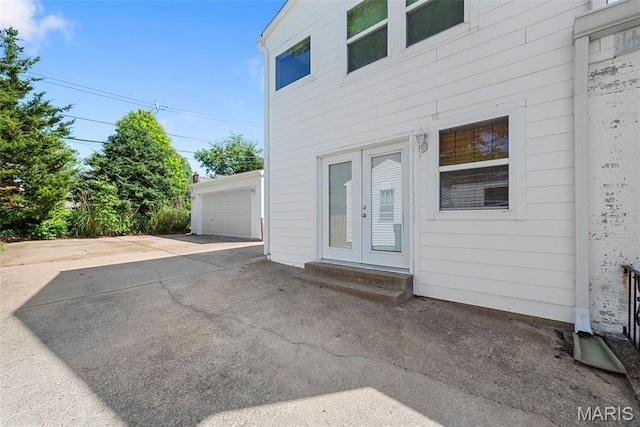 8261 Watson Rd, Saint Louis, MO 63119 - entrance to property featuring french doors and a garage