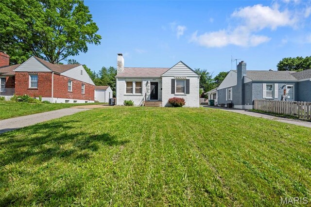 8261 Watson Rd, Saint Louis, MO 63119 - view of front of property featuring a chimney
