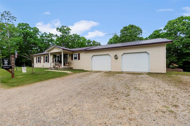 24864 Bcr 326, Marble Hill, MO 63764 - ranch-style home with dirt driveway, covered porch, a front lawn, metal roof, and an attached garage