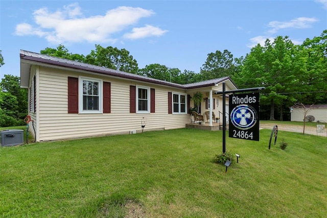24864 Bcr 326, Marble Hill, MO 63764 - view of front facade featuring a front yard and metal roof