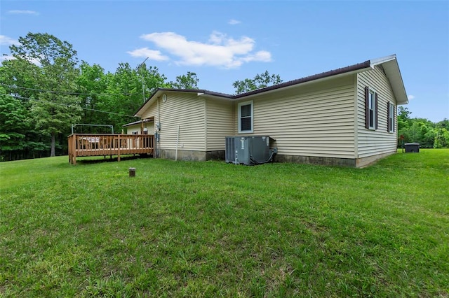 24864 Bcr 326, Marble Hill, MO 63764 - view of property exterior featuring a deck, central AC, and a lawn