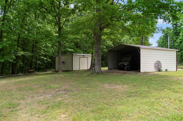 24864 Bcr 326, Marble Hill, MO 63764 - view of green lawn featuring a storage shed, an outbuilding, and a detached carport