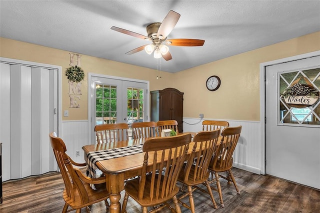 24864 Bcr 326, Marble Hill, MO 63764 - dining space with dark wood finished floors, french doors, a wainscoted wall, a ceiling fan, and a textured ceiling