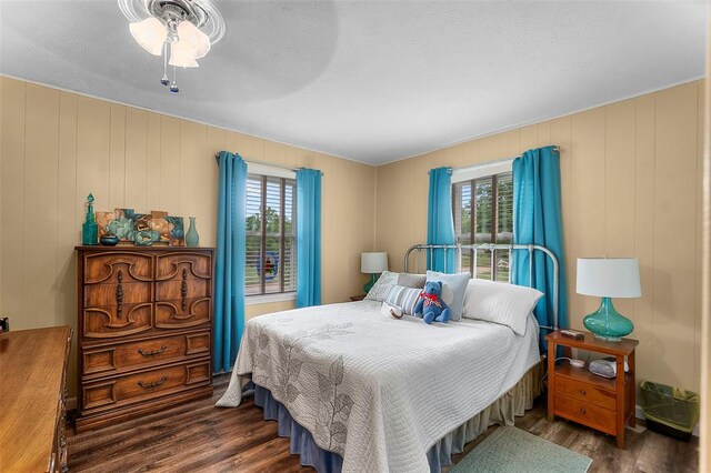 24864 Bcr 326, Marble Hill, MO 63764 - bedroom with wood finished floors and a decorative wall