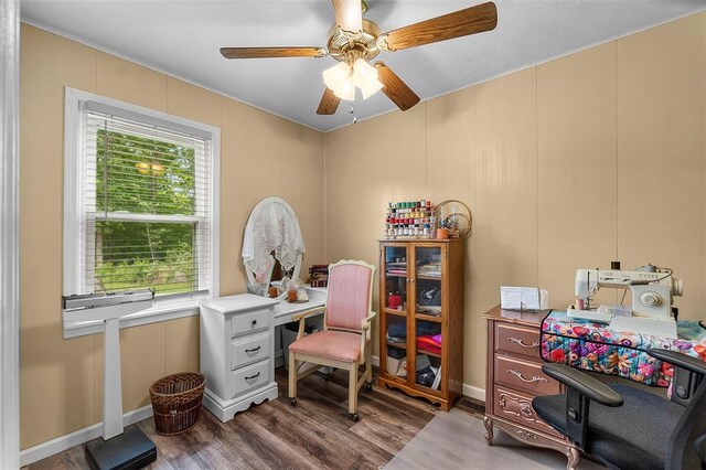 24864 Bcr 326, Marble Hill, MO 63764 - home office featuring ceiling fan, wood finished floors, and a decorative wall