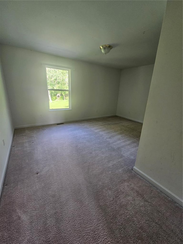 826 Oak Mill Ln, Imperial, MO 63052 - spare room with carpet and baseboards