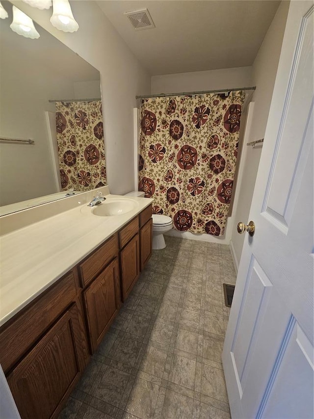 826 Oak Mill Ln, Imperial, MO 63052 - full bath with vanity, toilet, tile patterned floors, and a shower with shower curtain