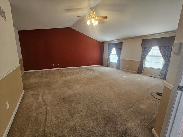 826 Oak Mill Ln, Imperial, MO 63052 - carpeted spare room featuring ceiling fan, lofted ceiling, and baseboards