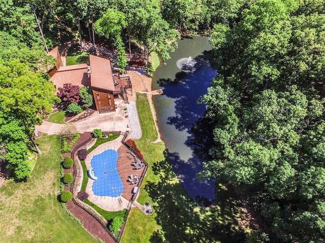 view of subject property featuring a large body of water and a pool area