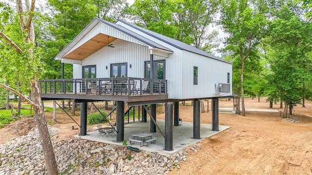 1300 River Valley Rd, Doniphan, MO 63935 - rear view of property featuring a patio, a deck, french doors, a carport, and stairway