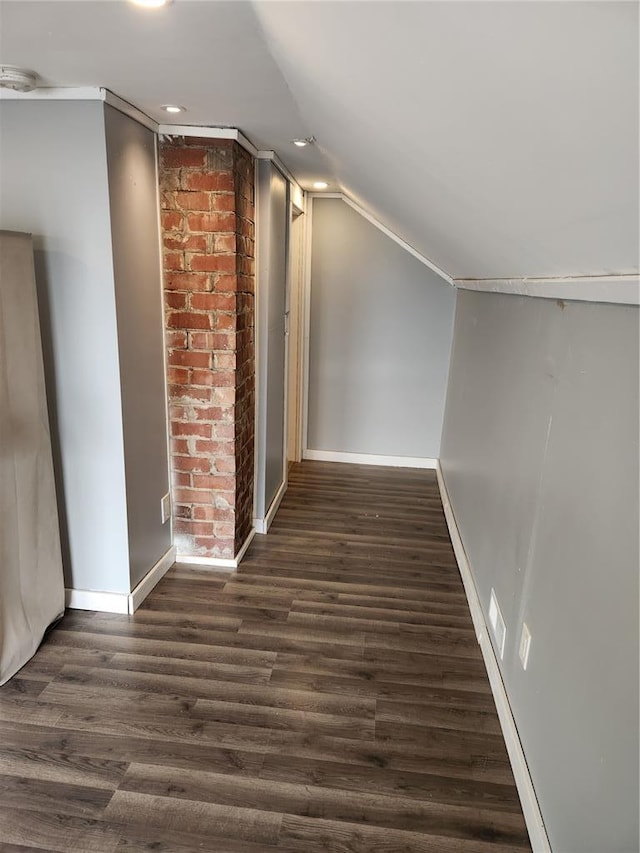 129 N Pence St, East Alton, IL 62024 - additional living space featuring baseboards, vaulted ceiling, dark wood finished floors, and recessed lighting