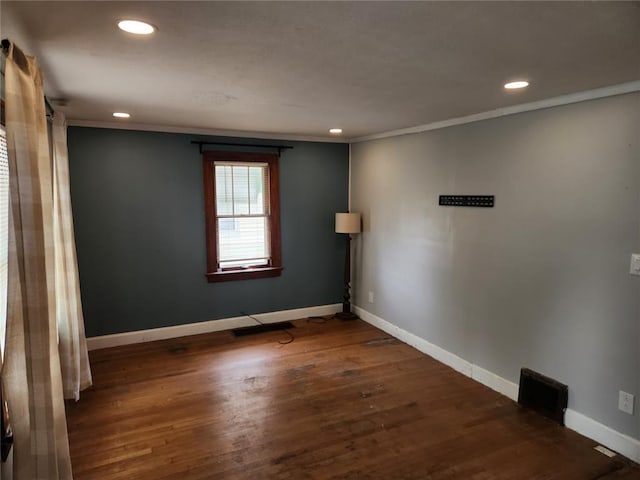 129 N Pence St, East Alton, IL 62024 - unfurnished room with recessed lighting, baseboards, wood finished floors, and ornamental molding