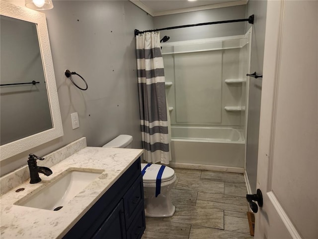 129 N Pence St, East Alton, IL 62024 - bathroom featuring toilet, vanity, shower / bath combo with shower curtain, wood tiled floors, and crown molding