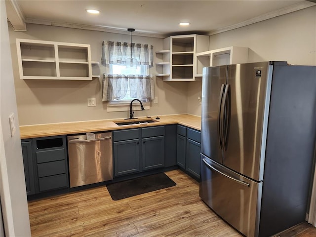 129 N Pence St, East Alton, IL 62024 - kitchen featuring stainless steel appliances, open shelves, a sink, light wood-type flooring, and recessed lighting