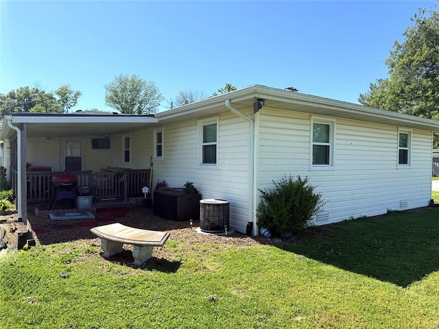 106 W Iowa St, Trenton, IL 62293 - back of property with a yard and central AC