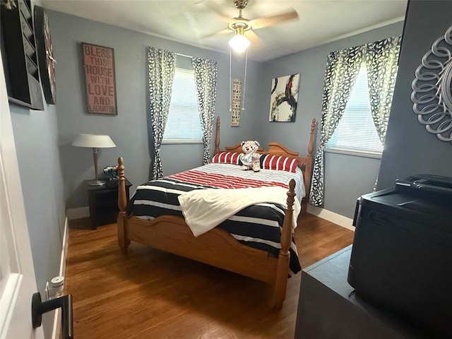 106 W Iowa St, Trenton, IL 62293 - bedroom featuring wood finished floors, baseboards, and ceiling fan