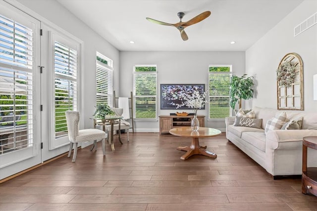2604 Center Ave, Wildwood, MO 63040 - living room featuring ceiling fan, healthy amount of natural light, recessed lighting, and hardwood / wood-style flooring