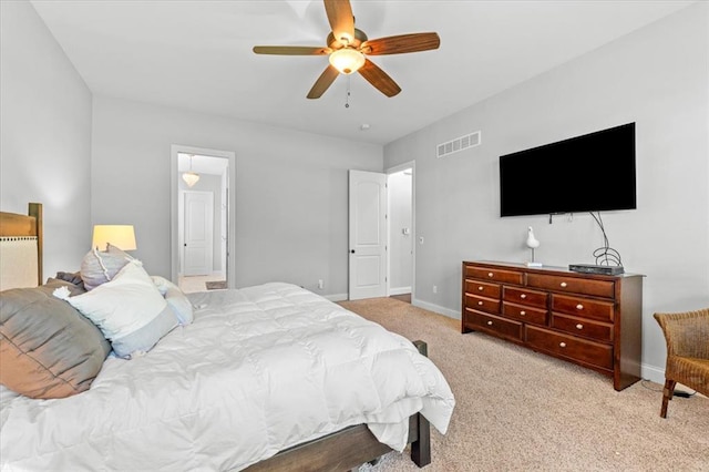2604 Center Ave, Wildwood, MO 63040 - bedroom featuring baseboards, light carpet, and a ceiling fan
