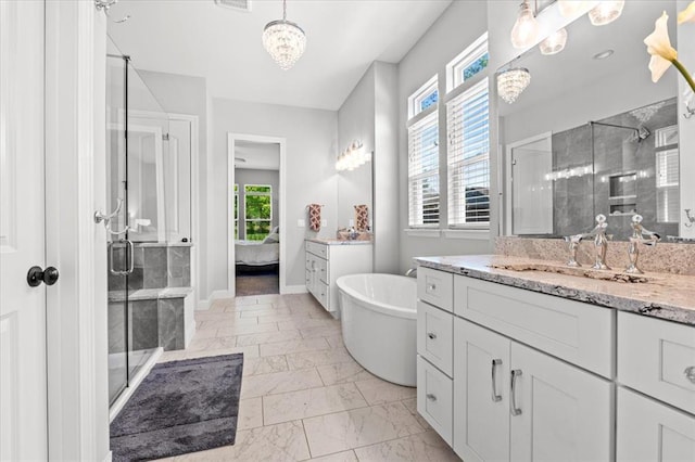 2604 Center Ave, Wildwood, MO 63040 - bathroom featuring a stall shower, vanity, and a chandelier