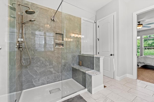 2604 Center Ave, Wildwood, MO 63040 - ensuite bathroom with a stall shower, marble finish floors, baseboards, and a ceiling fan