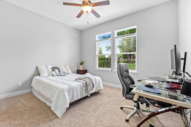 2604 Center Ave, Wildwood, MO 63040 - carpeted bedroom featuring baseboards, an office area, and a ceiling fan
