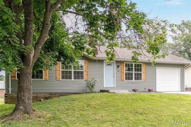 10 Jade Ln, Washington, MO 63090 - view of front of house featuring a garage, a front yard, driveway, and entry steps
