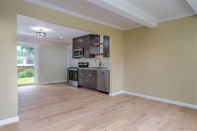 10 Jade Ln, Washington, MO 63090 - kitchen featuring appliances with stainless steel finishes, open shelves, light wood-type flooring, dark brown cabinets, and crown molding
