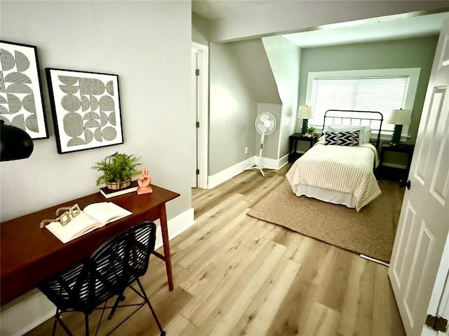 2327 Shirley Ave, Jennings, MO 63136 - bedroom with light wood-style floors and baseboards