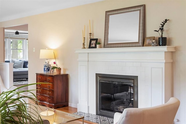 5 Homestead Acres, Olivette, MO 63132 - living room featuring a fireplace with flush hearth and baseboards