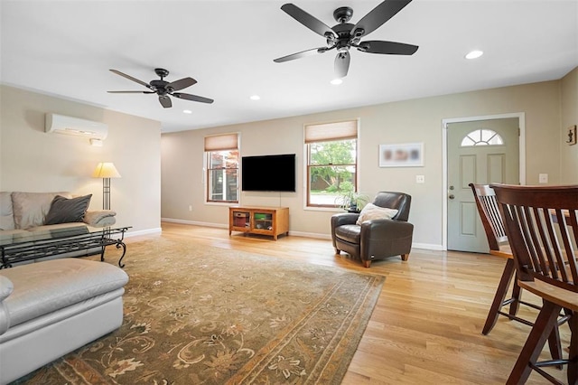 5 Homestead Acres, Olivette, MO 63132 - living room with an AC wall unit, a ceiling fan, light wood-style floors, baseboards, and recessed lighting