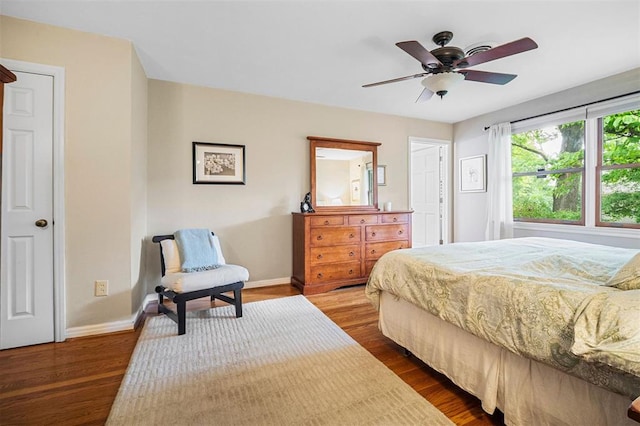 5 Homestead Acres, Olivette, MO 63132 - bedroom featuring baseboards, dark wood finished floors, and a ceiling fan